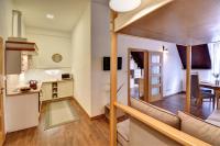 Kuchyň nebo kuchyňský kout v ubytování Apartmány Třeboň BÍLÝ BERÁNEK