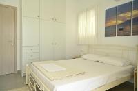 Postel nebo postele na pokoji v ubytování Isidoros Apartments