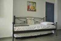 Postel nebo postele na pokoji v ubytování Isidoros Apartments
