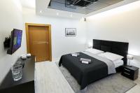 Postel nebo postele na pokoji v ubytování Prestige Apartamenty VINCI Centrum