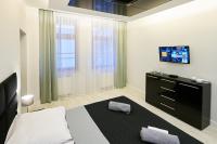 TV a/nebo společenská místnost v ubytování Prestige Apartamenty VINCI Centrum