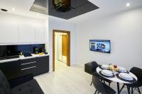 Kuchyň nebo kuchyňský kout v ubytování Prestige Apartamenty VINCI Centrum