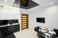 Kuchyň nebo kuchyňský kout v ubytování Prestige Apartamenty VINCI Centrum