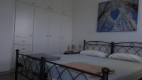 Postel nebo postele na pokoji v ubytování Isidoros Apartments