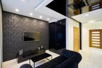 TV a/nebo společenská místnost v ubytování Prestige Apartamenty VINCI Centrum