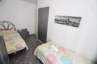 Posteľ alebo postele v izbe v ubytovaní COSTA DAURADA APARTAMENTS - San Remo