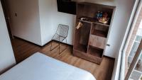 Soy Local Parque La 93にあるベッド