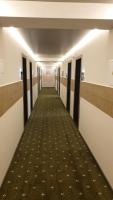 an empty hallway in an office building at River Park hotel in Kovelʼ