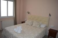 Postel nebo postele na pokoji v ubytování Hotel Doña Carmen
