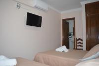 Postel nebo postele na pokoji v ubytování Hotel Doña Carmen