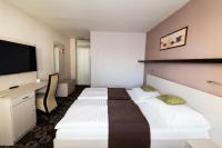 Łóżko lub łóżka w pokoju w obiekcie Parkhotel Plzen Congress Center