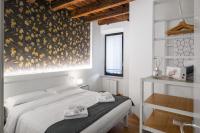Posteľ alebo postele v izbe v ubytovaní Flats4Rent Casa di Tea