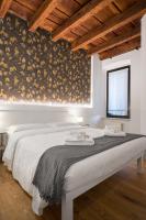 Posteľ alebo postele v izbe v ubytovaní Flats4Rent Casa di Tea