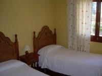 Postel nebo postele na pokoji v ubytování Villas Aloha Valdelagrana