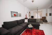 A seating area at Mythic House