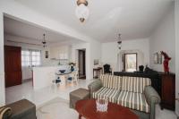 A seating area at Mythic House