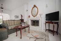 A television and/or entertainment centre at Mythic House