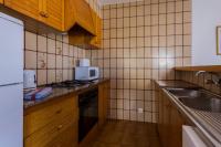 Kuchyň nebo kuchyňský kout v ubytování Villas 84 Est & Oest, Son Bou By MENORCARENTALS