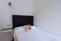 Postel nebo postele na pokoji v ubytování Villas 84 Est & Oest, Son Bou By MENORCARENTALS