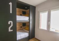 Postel nebo postele na pokoji v ubytování Tinto Dreams Hostel