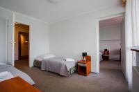 Posteľ alebo postele v izbe v ubytovaní Hotel Karolinka