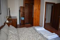 A bed or beds in a room at VILLA CLANI apartment