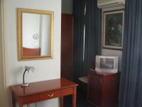 Telewizja i/lub zestaw kina domowego w obiekcie Hotel Tortorina