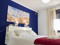 Posteľ alebo postele v izbe v ubytovaní Apartamentos Villa Serali Parking Gratis