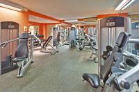 a gym with treadmills and cardio machines at Crowne Plaza Chicago O'Hare Hotel & Conference Center by IHG in Rosemont