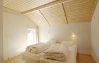 Postel nebo postele na pokoji v ubytování Holiday Home Aakirkeby Liii