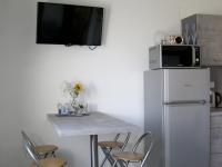 Kuchyň nebo kuchyňský kout v ubytování Apartmán u Révy