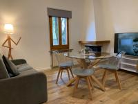 Televízia a/alebo spoločenská miestnosť v ubytovaní La Coroncina Lodging