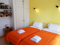 Postel nebo postele na pokoji v ubytování Eva Apartments