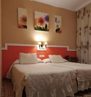 Posteľ alebo postele v izbe v ubytovaní Hotel Sierra de Araceli Lucena
