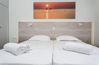 Postel nebo postele na pokoji v ubytování Heart of Paros Apartments
