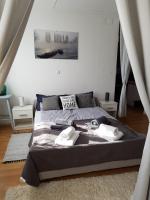 Posteľ alebo postele v izbe v ubytovaní Apartman Atelier