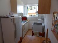 Kuchyň nebo kuchyňský kout v ubytování Eva Apartments