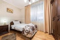 Postel nebo postele na pokoji v ubytování Vazov Residence , two bedroom top centre apartment