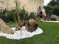 A garden outside Appartamenti Budoni