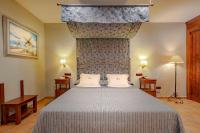 Posteľ alebo postele v izbe v ubytovaní Hospedium Hotel Retiro del Maestre
