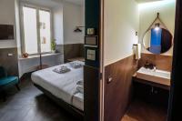 Posteľ alebo postele v izbe v ubytovaní Ottaviano Smart Rooms