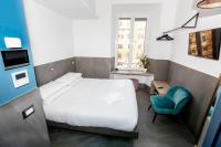 Posteľ alebo postele v izbe v ubytovaní Ottaviano Smart Rooms