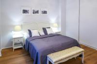 Posteľ alebo postele v izbe v ubytovaní White & Gray Apartments