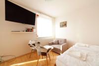Postel nebo postele na pokoji v ubytování Vitkov Park Apartment
