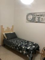 A bed or beds in a room at Casa Vacanze Kristel