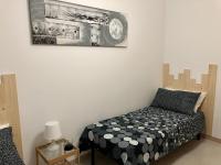A bed or beds in a room at Casa Vacanze Kristel