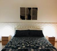 A bed or beds in a room at Casa Vacanze Kristel