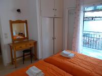 Postel nebo postele na pokoji v ubytování Eva Apartments