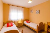 A bed or beds in a room at Club Villamar - Abel