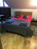 Posteľ alebo postele v izbe v ubytovaní Apartamenty Maria